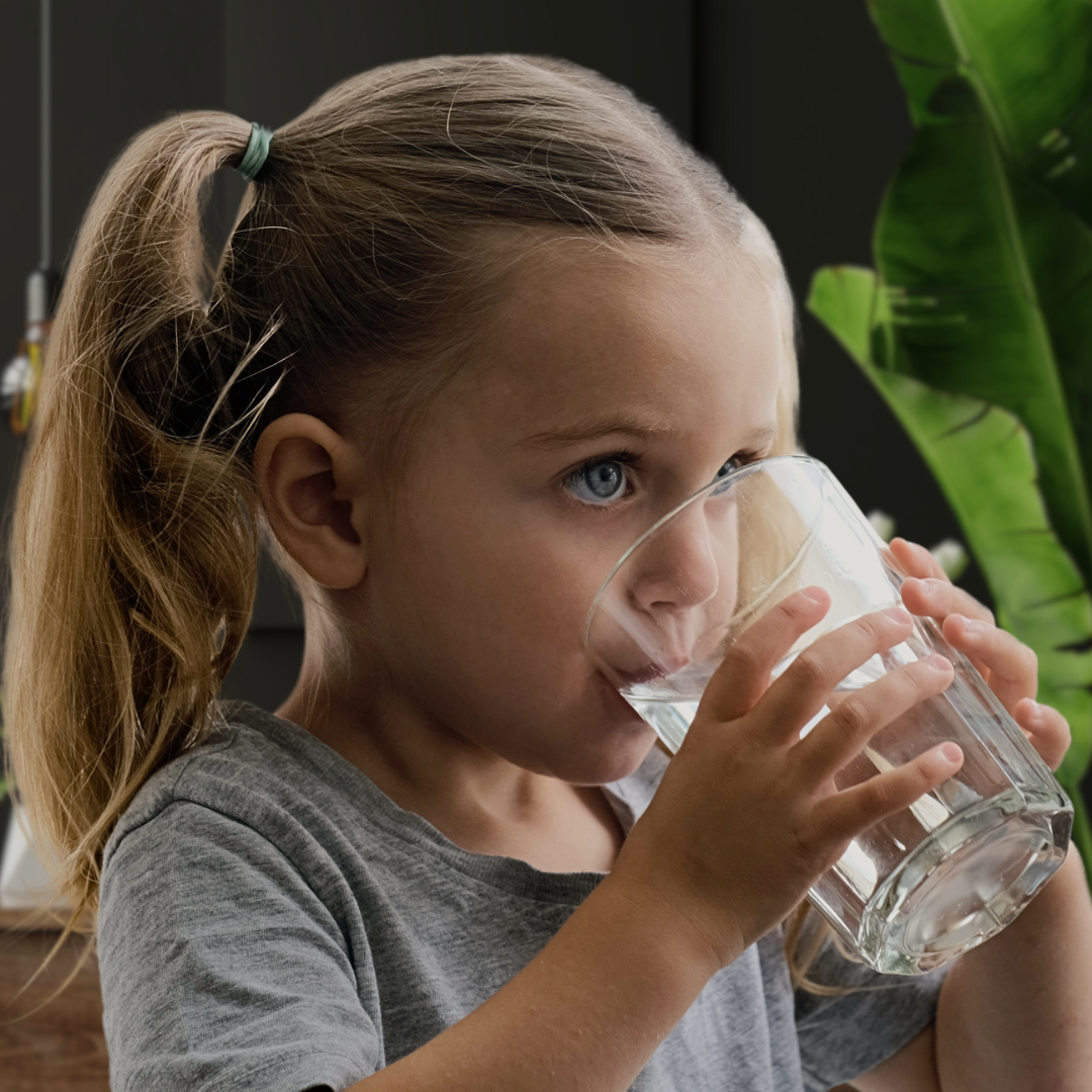 Girl drinking glass of water